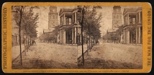 Meeting St., near Broad, Charleston, S.C., looking north. St. Michael's Church