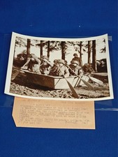 ORIGINAL WWII PHOTO OF G.I.'S IN AN ABANDONED BOAT.