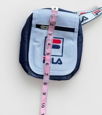 Preços baixos em Bolsas FILA Branco para Homens