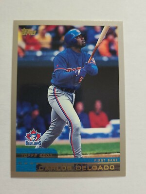 CARLOS DELGADO 2000 TOPPS BASEBALL CARD # 93 E2497