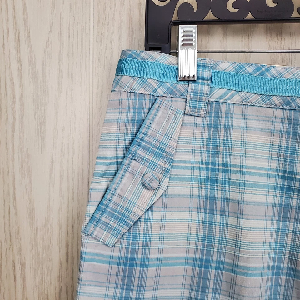 Cinturón corto de golf Greg Norman azul bebé gris y blanco a cuadros talla 8 cinta sintética Foto 2 de 4