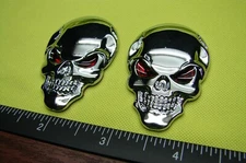 (2) SKULL 3D METAL CAR EMBLEM STICKER DECAL LOGO. SILVER CHROME FINISH