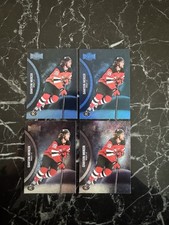 (4) Dawson Mercer 2021-22 Metal Universe w/ Blue Spectrum Rookie Card #188. rookie card picture