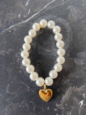 Pearl necklace with heart for a pet