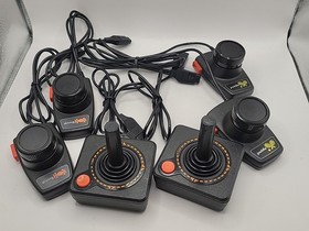 Atari 2600 System Bundle with Console ,8 Games, Joysticks, Paddles, & Dust Cover