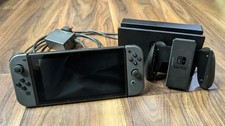 Nintendo Switch Console, 32GB + Grey Joy-Cons, Handheld Grip and Charger