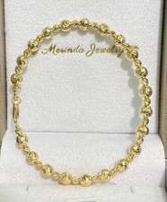 18k Solid Yellow Gold Lady Italian Shiny Beaded Oval Bangle. Size 60mm