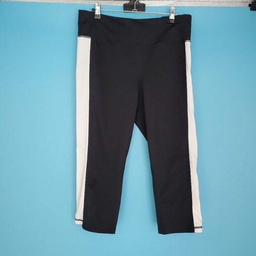 Ideology Damen-Leggings Größe Large kurz geschnitten schwarz mit weißen Seitenstreifen