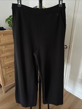 Calvin Klein Relaxed Dress Pant. Size small. 24 inseam. Pockets. Black.