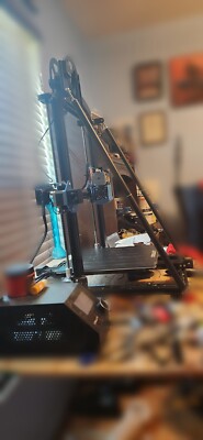 Creality Cr10 V3 3D printer with 2 filament rolls and spare parts.