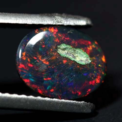 NATURAL AAA+ DAZZLING COLOR PLAY OVAL CABOCHAN ETHIOPIAN BLACK WELO OPAL 1.00CTS - Bild 3 von 3