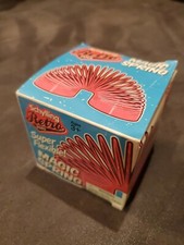 Schylling Retro Magic Blue Plastic Spring Slinky Toy -Walks Down Stairs