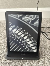 Kindle Paperwhite 11th Gen 32GB Wi-Fi bundled With Cover And Charging Station.