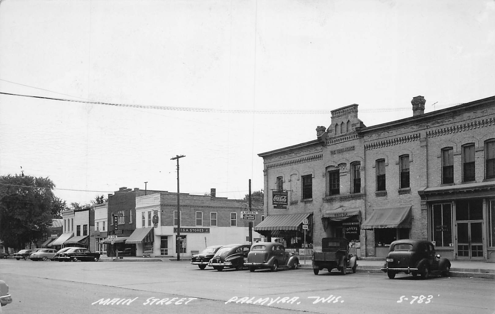J74/ Palmyra Wisconsin RPPC Postcard c4050s Business Section Stores 17