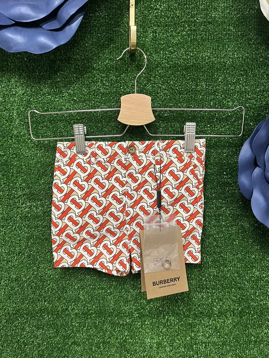 Burberry brand new kids orange monogram print shorts size 18