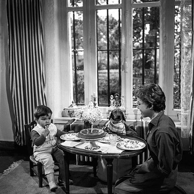 Cecile Aubry at the table with her son Medhi el Glaoui and his dog Old Photo