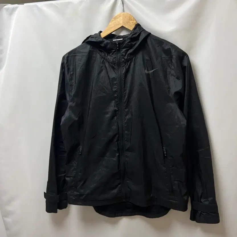 Nike Essential Swoosh Running Windbreaker, Women's M, Black, Lightly Used thumbnail 2