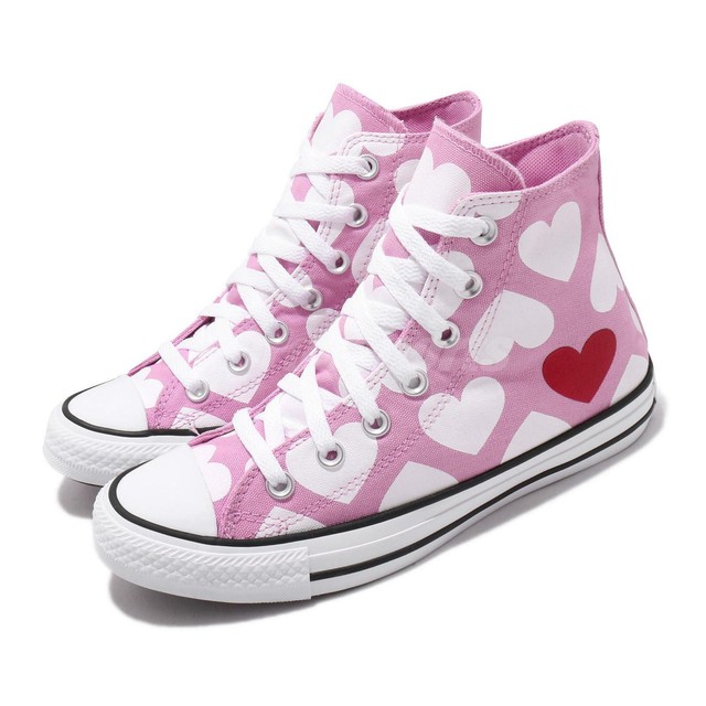 women converse with hearts
