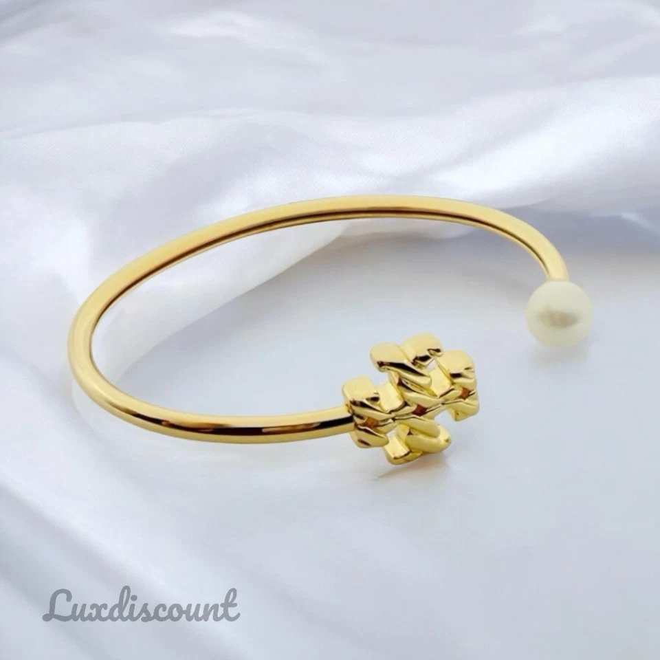 Pulseira Tory Burch folheada a ouro 18K com logotipo de corda texturizada pérola punho flexível - Imagem 3 de 4