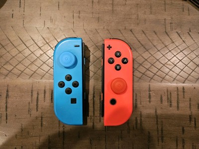 Never-Drift Never-Slide Official Nintendo Switch Joy-Cons. Red + Blue