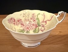 VINTAGE PARAGON DBL WARRANT TEA CUP LILAC PATTERN - YELLOW BACKGROUND