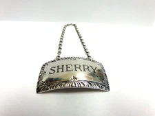 Sterling Silver bottle/decanter Tag Sherry Stieff co sz 2 in wide wgt 13.9 grams