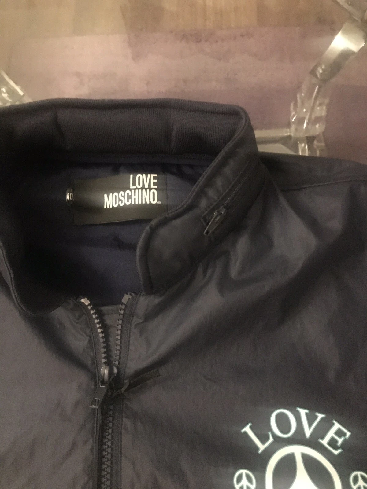 Prezzo consigliato £347!!! Giacca a vento Moschino leggera con zip e cappuccio nuova