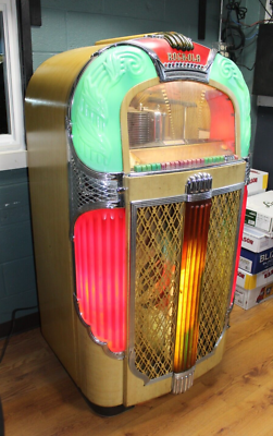 All original 1948 Rock-Ola Model 1428 Magic-Glo Jukebox in working
