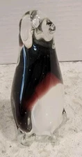 Penguin Art glass paperweight 4 3/4 x 2 3/4
