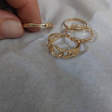 Vintage new Yellow Gold baby rings Set of 4, all under size 1-2