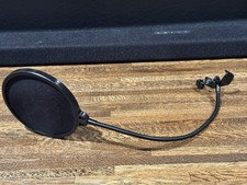 microphone pop filter, used in recording studios podcasting to improve vocals