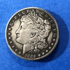 1884 O Morgan Silver Dollar circulated