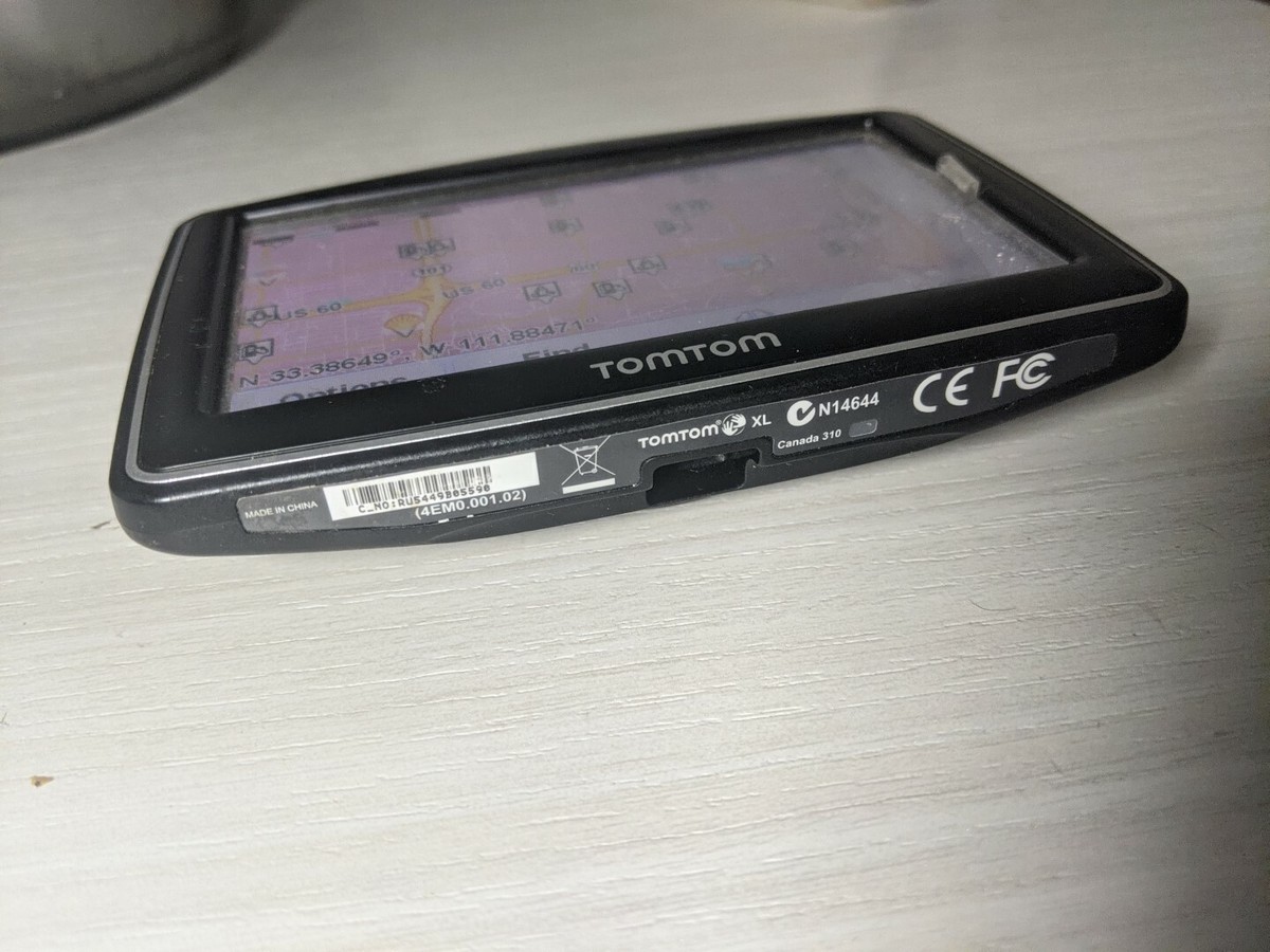 TOM TOM XL GPS N14644 Turns On just fine, sold AS SHOWN w/ usb 310