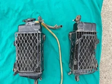 84 honda cr125 factory original radiators oem with grill guards