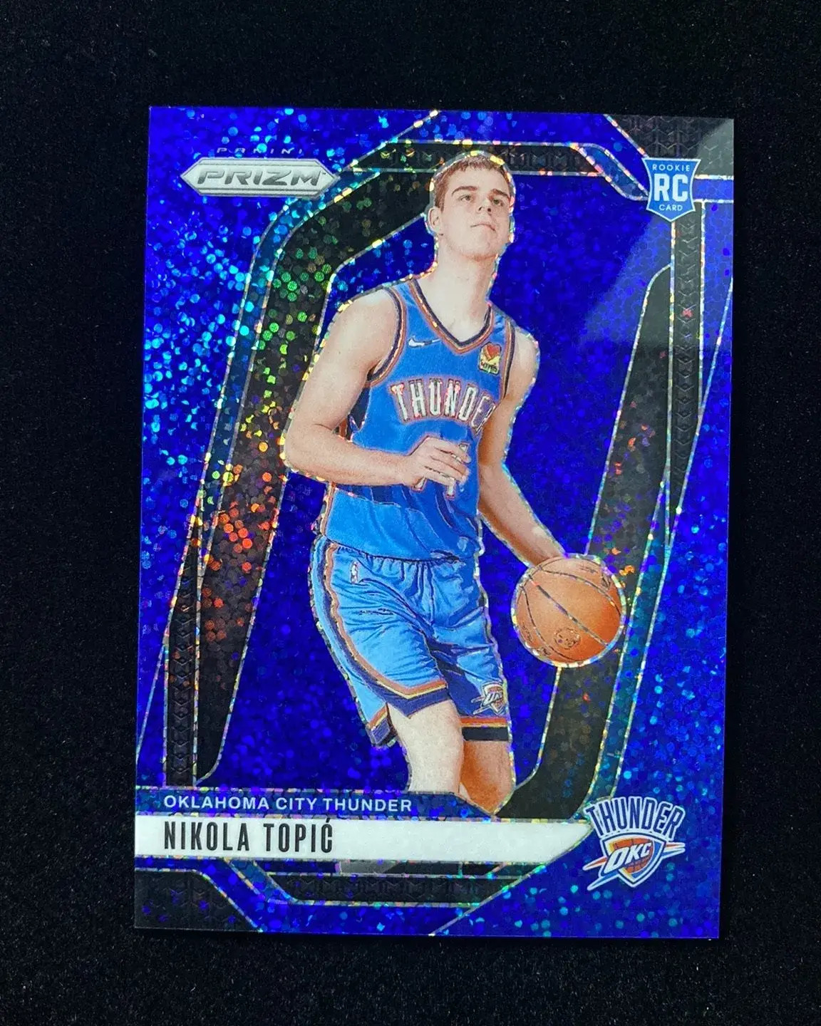 2024-25 Prizm Nikola Topic Rookie Base Blue Sparkle #230 RC 024/144 OKC -OC03