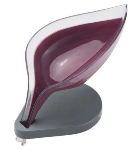 Distributeurs et porte-savons rouges pour la salle de bain