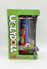 Schylling UGLYDOLL Super Awesome Rocket Ride Wind-up Tin Toy