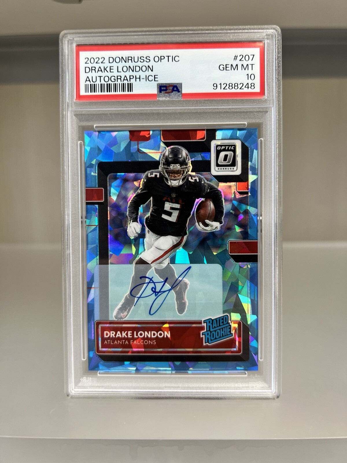 Drake London Donruss Optic /15 Blue Cracked Ice Rookie On-Card Auto PSA 10