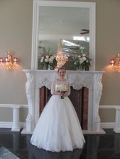 Warm white luxurious lacy wedding dress