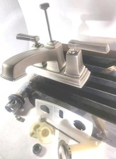 Bathroom faucet in brushed nickel finish, Preowned. Moen Still works