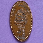 SANTA WITH LARGE TOY SACK Merry Christmas 2000 Elongated 2000 Pressed Penny — photo 1