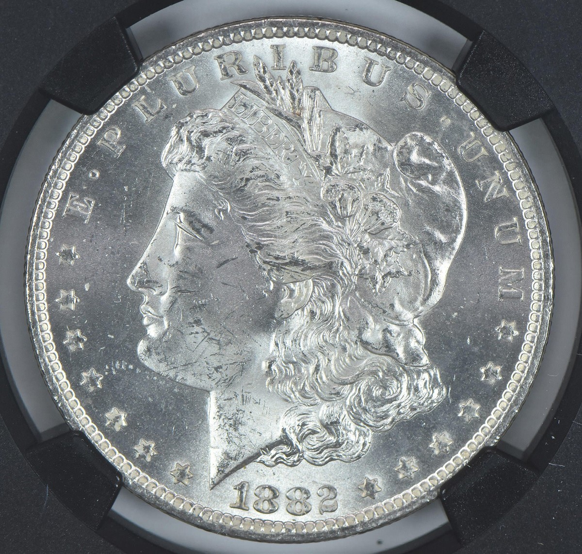 1882-CC Morgan Silver Dollar Original Bag Fragment MS63 NGC Red