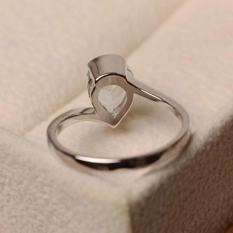 Alianza de compromiso de aguamarina real corte pera de 2,00 quilates de oro blanco macizo de 14 quilates Foto 4 de 4