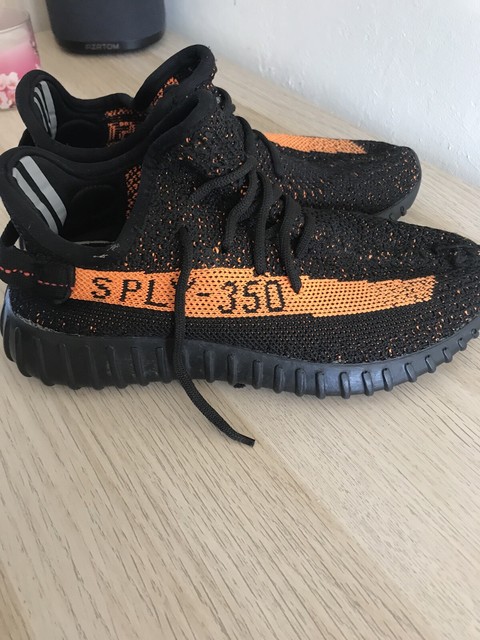 black loafers with gold spikes