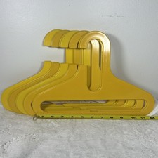 VINTAGE MCM/MOD/Space age Yellow plastic clothes hanger. Set of 10