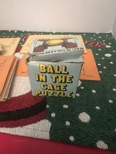 Vintage Ball In The Cage Puzzle.