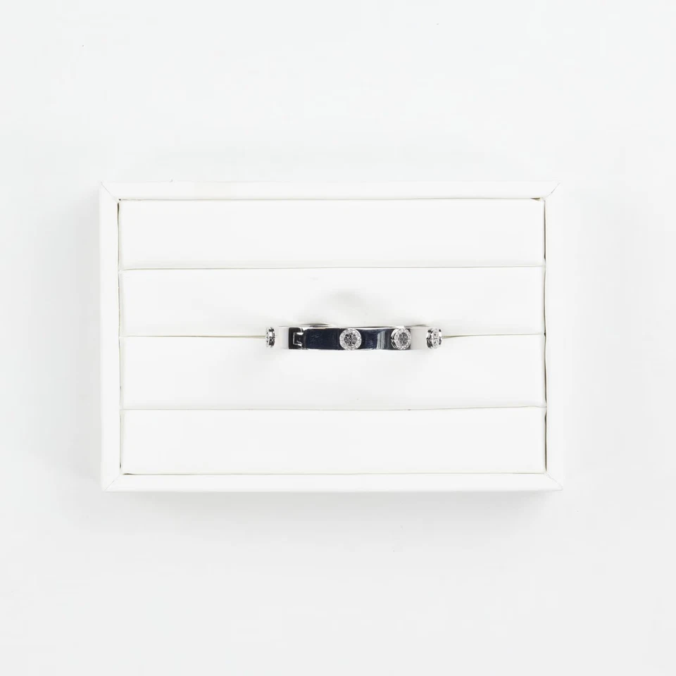 Brazalete con bisagra de acero inoxidable y cristal plateado TORY BURCH S PRECIO DE VENTA SUGERIDO POR EL FABRICANTE 195 Foto 3 de 4