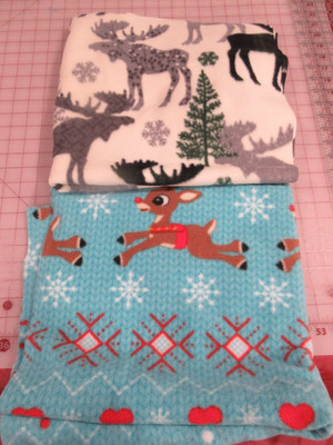Fleece Fabric - Rudolph on Lt. Blue 29'' x 56'' and Moose on Cream 30'' x 53''