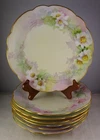 Seven Antique Porcelain HP Pastel Floral Side Plates Gold - French Bavarian