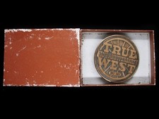 TI01135 NOS VINTAGE 1983  TRUE WEST 30TH ANNIVERSARY  MAGAZINE BELT BUCKLE